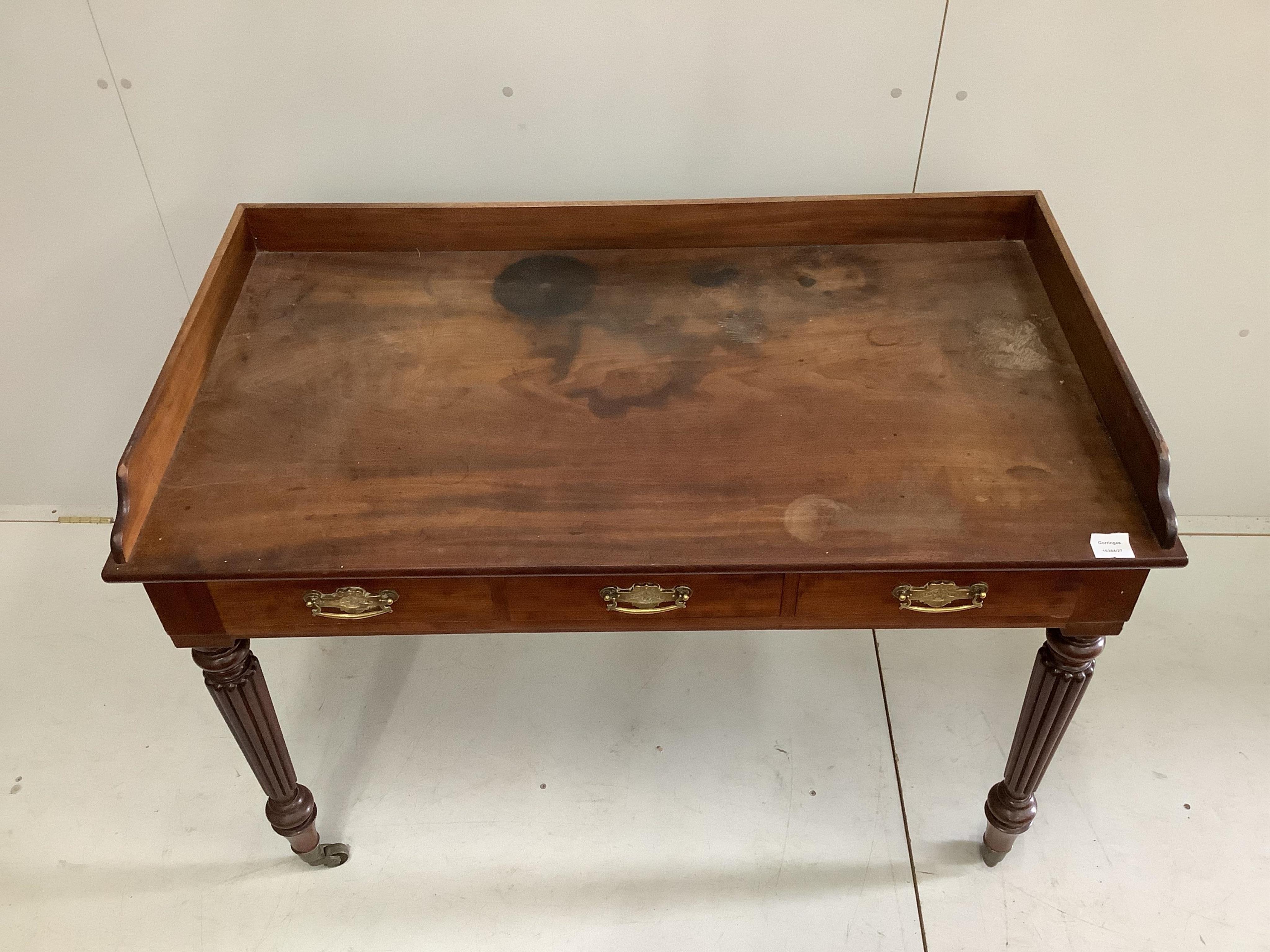 A Victorian mahogany washstand (loose top), width 115cm, depth 63cm, height 84cm. Condition - fair